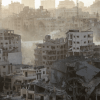 A VIEW OF RUINS AND DEMOLISHED BUILDINGS FOLLOWING ISRAELI AIR STRIKES ON THE AL-RIMAL NEIGHBORHOOD IN THE GAZA STRIP ON OCTOBER 12, 2023. (PHOTO: ATIA DARWISH/APA IMAGES)